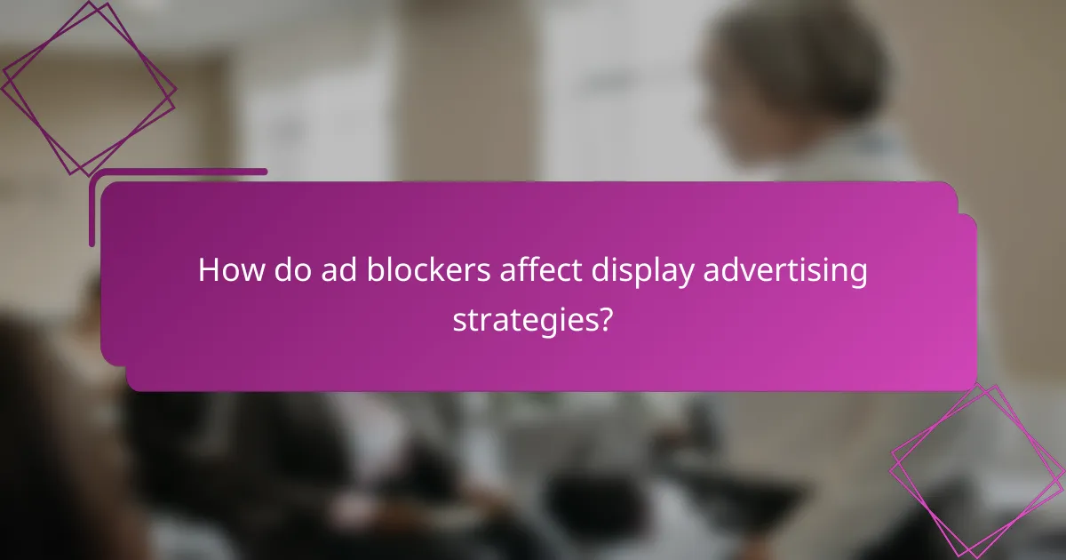How do ad blockers affect display advertising strategies?